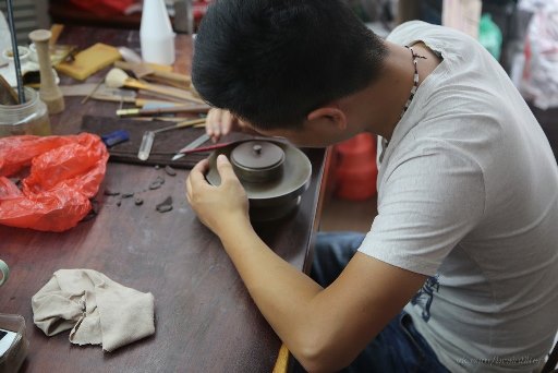 производство исинского чайника